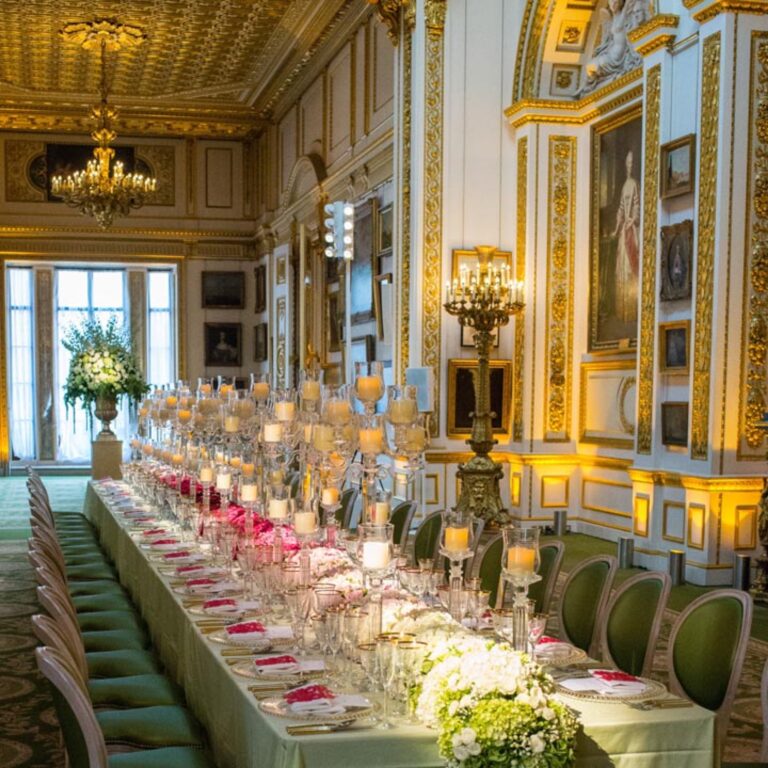 A long reception table in a gilded room at a Niemierko wedding at Lancaster House