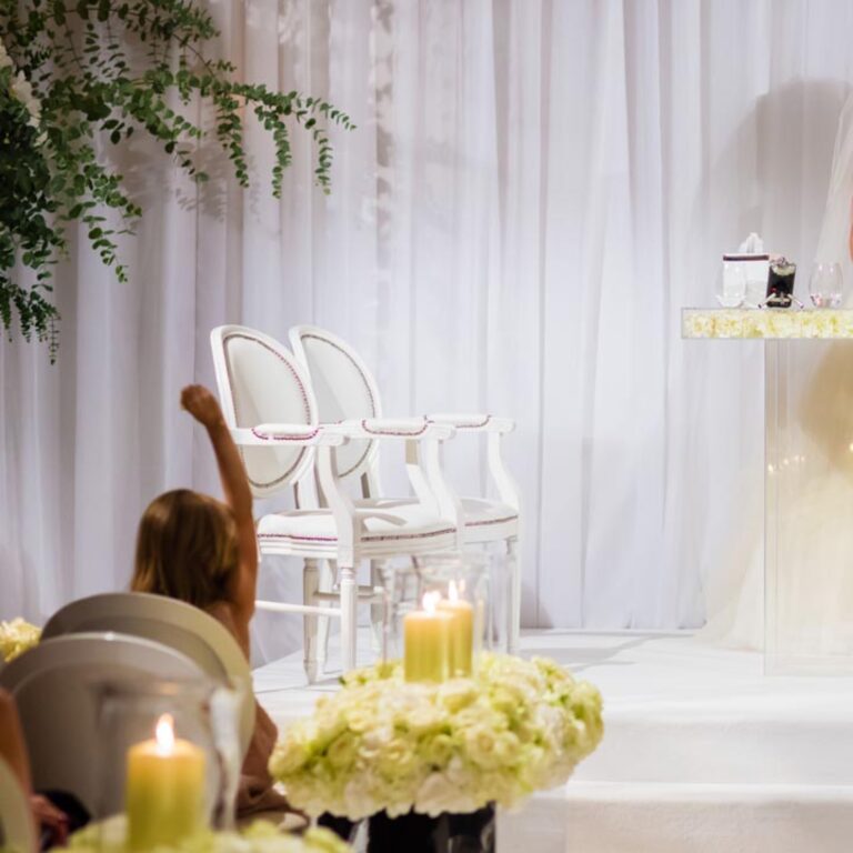 A white ceremony setting at a Niemierko wedding at Four Seasons Hampshire