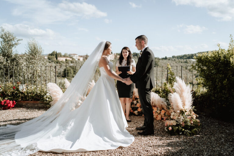 A symbolic ceremony on a garden terrace, pampas and peach roses either side, Noemi Andretta officiating, Noemi Wedding