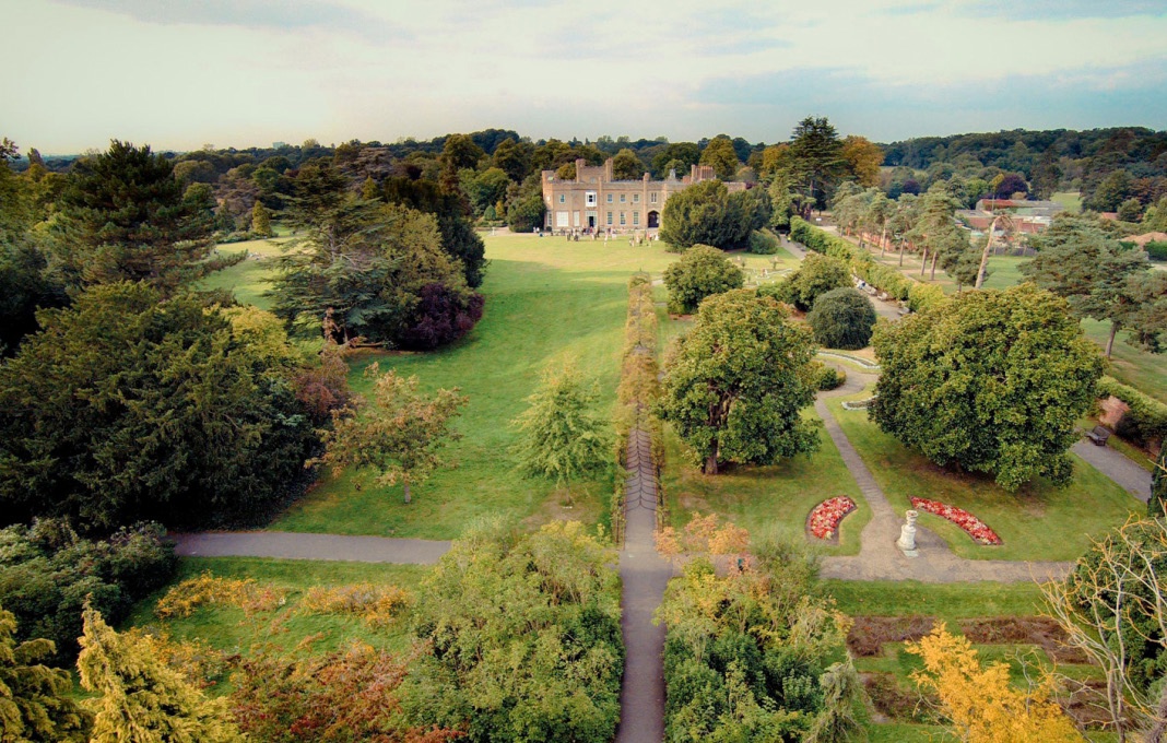 Aerial view of the gardens with the mansion beyond, Non Such Mansion