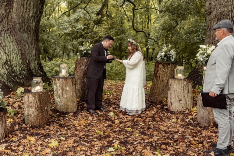Woodland elopement ceremony among autumn leaves, Nordic Adventure Weddings