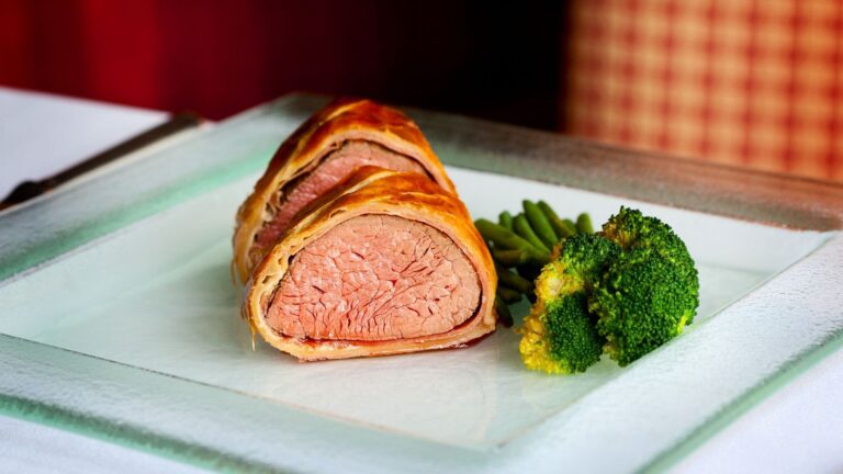 Slices of beef wellington with green beans and broccoli, Northcote Manor Hotel