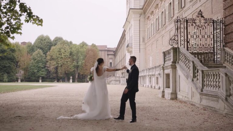 The couple dancing on the forecourt of a palace, from Giusy and Alessandro's trailer, Nozze da film