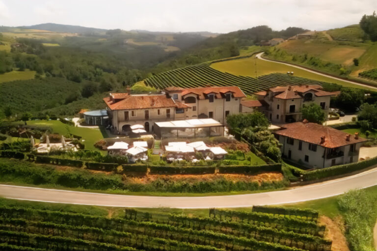 Drone view of La Torricella among the vineyards of Monforte d'Alba in the Langhe, Jessica and Simone's wedding, July 2023, Nozze da film