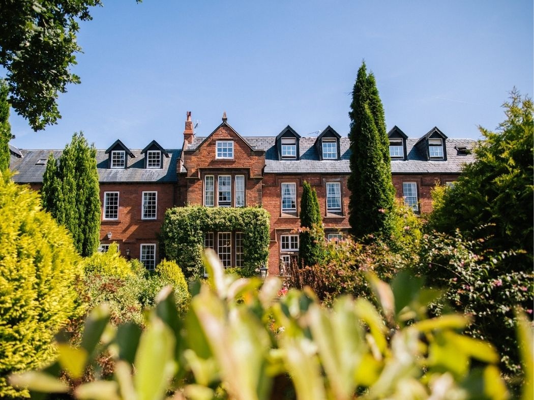 Nunsmere Hall Hotel through the summer gardens, Nunsmere Hall Hotel