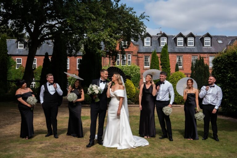 A wedding party on the lawns at Nunsmere Hall, the hall behind, Nunsmere Hall Hotel