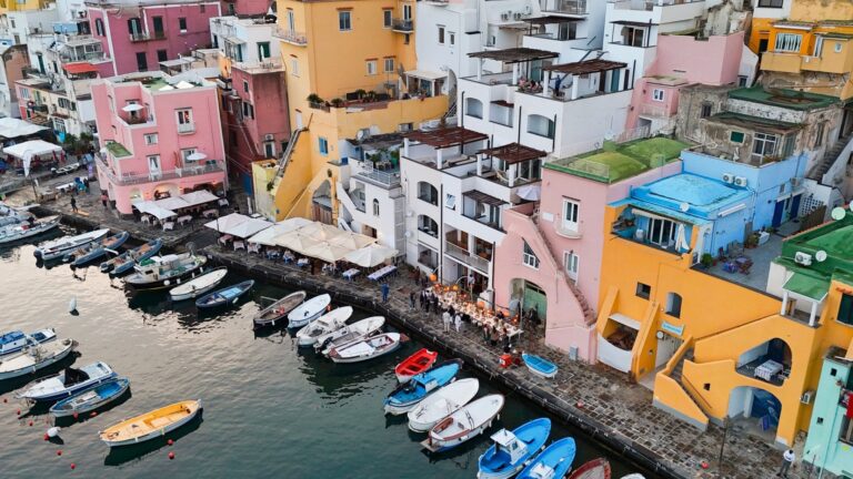Marina Corricella from above, the pastel houses stacked over the quay, O'Sarracino Events