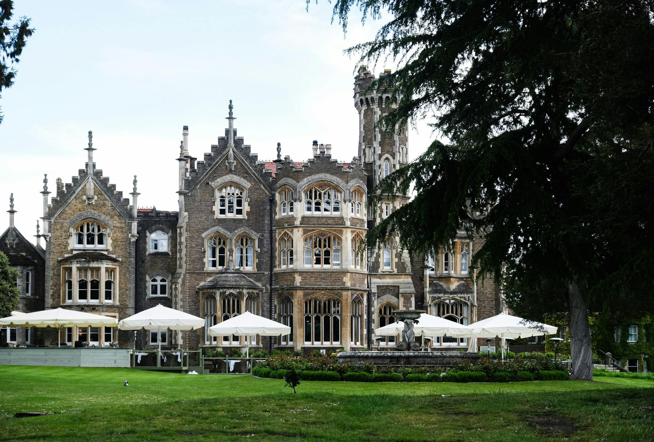 The mansion house and its tower seen from the lawn, Oakley Court Hotel, Windsor