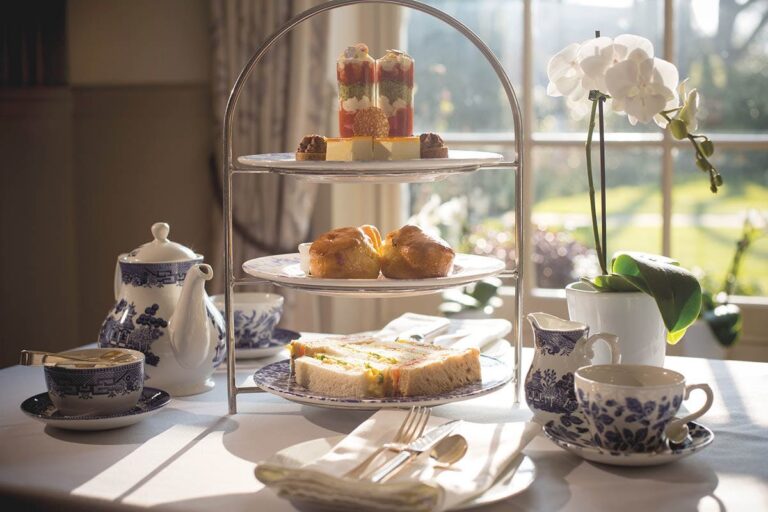 Afternoon tea served by a window, Oakley Court Hotel, Windsor