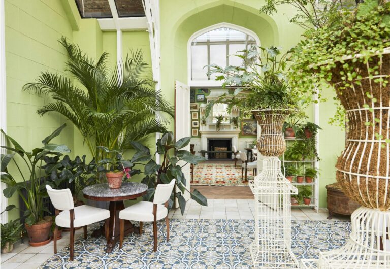 A conservatory with palms and a tiled floor, Oakley Court Hotel, Windsor