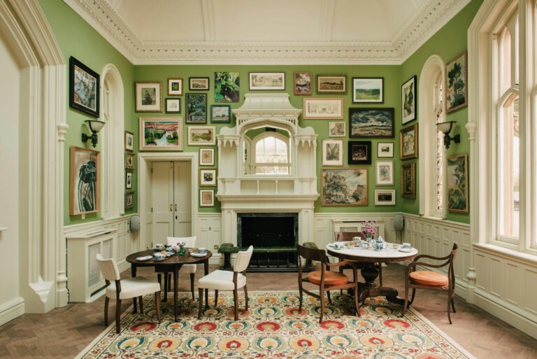A green mansion room hung with artworks, Oakley Court Hotel, Windsor