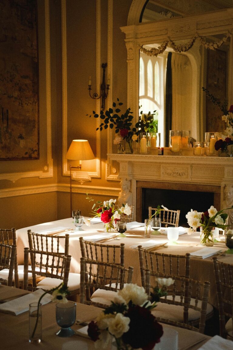 A mansion dining room lit by candles, Oakley Court Hotel, Windsor