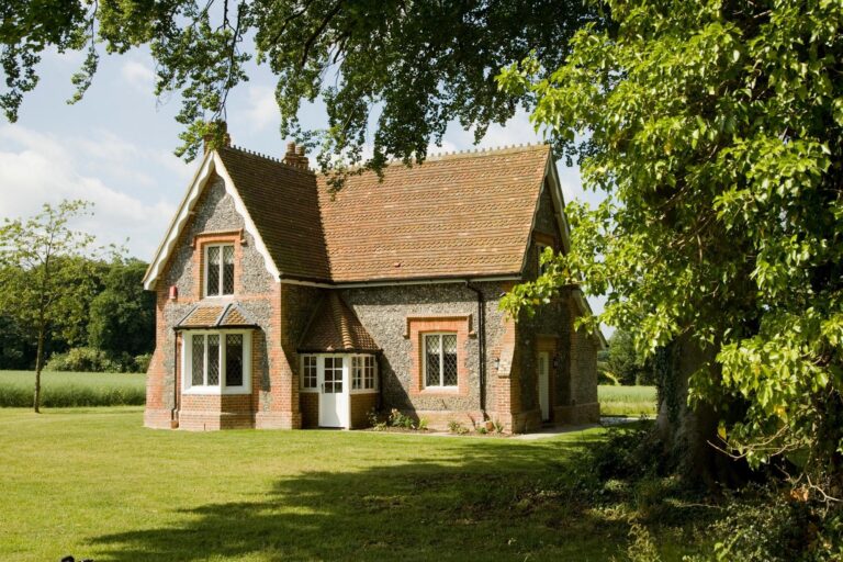 The three-bedroom Garden Cottage on the rear lawns, in brick and flint, Oakley Hall Hotel