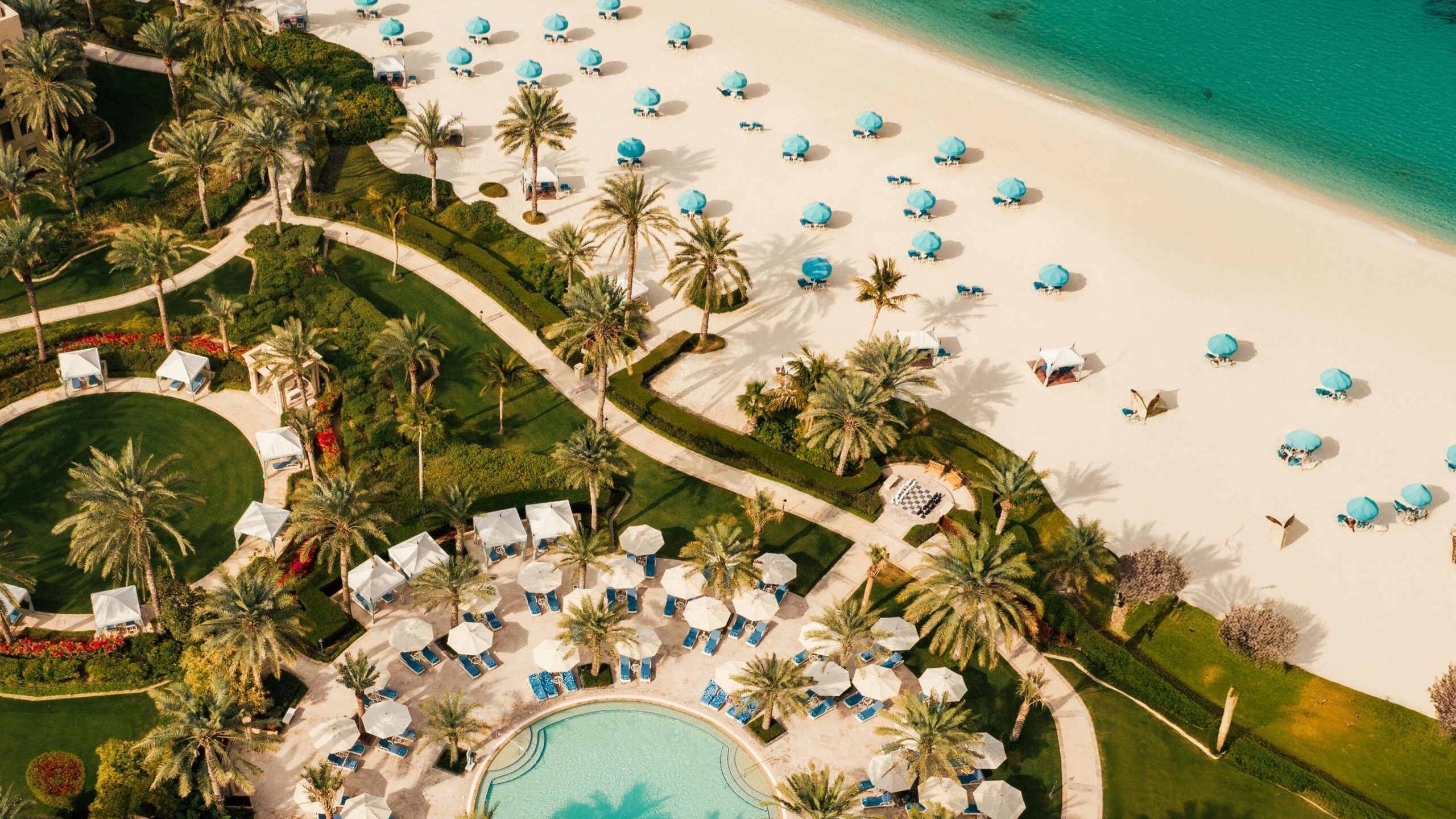 The beach, pool and gardens seen from above, One&Only Royal Mirage
