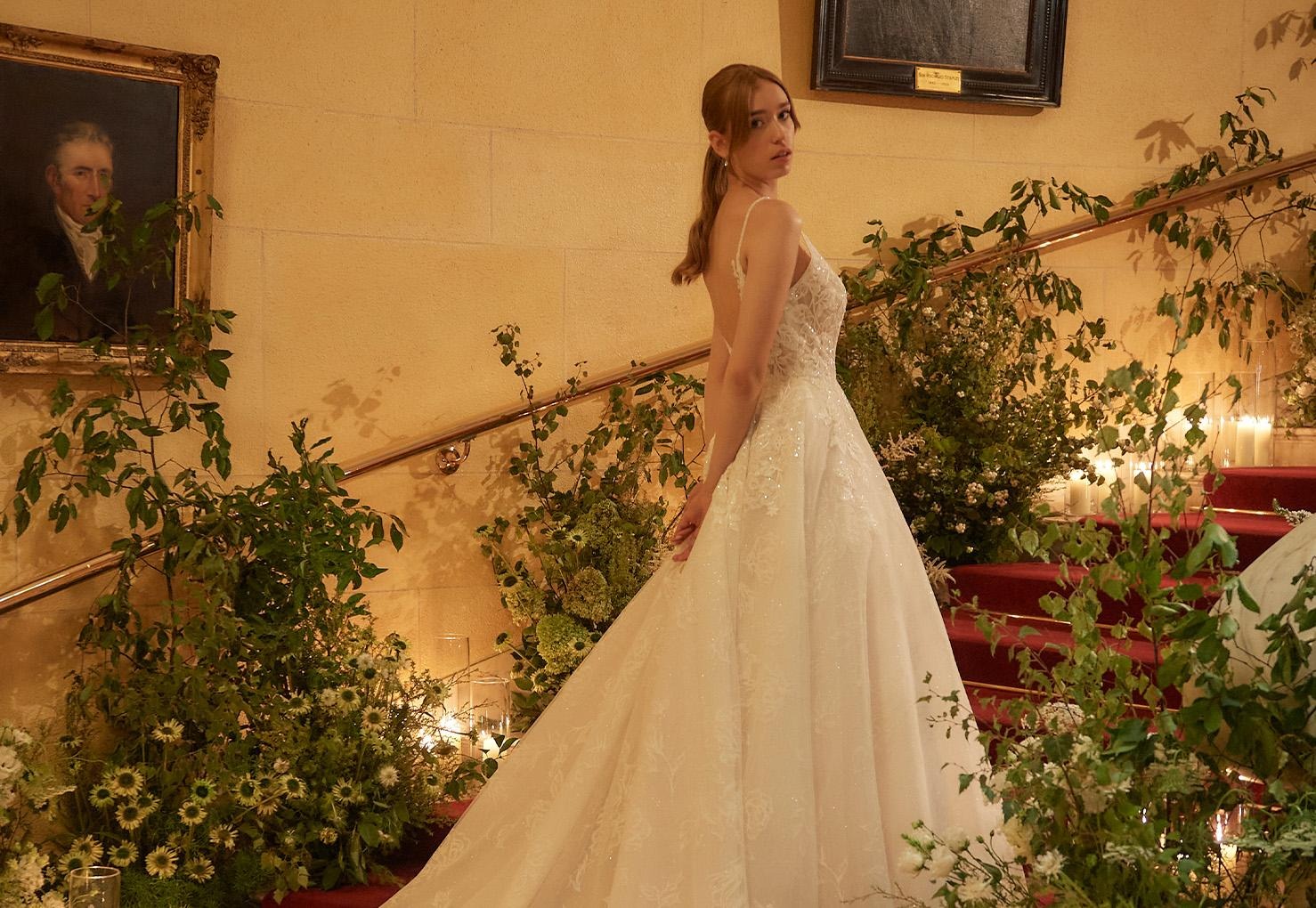 A bride on the grand staircase among flowers, One Whitehall Place