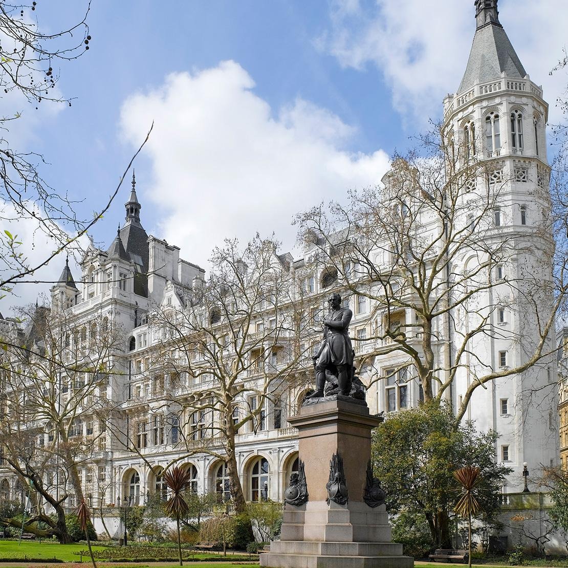 The Victorian facade of the building on the Embankment, seen from the gardens, One Whitehall Place