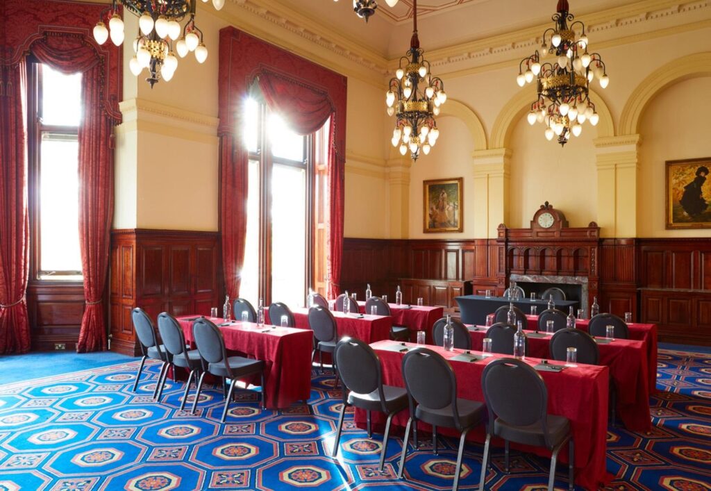 The River Room laid out with long tables, One Whitehall Place