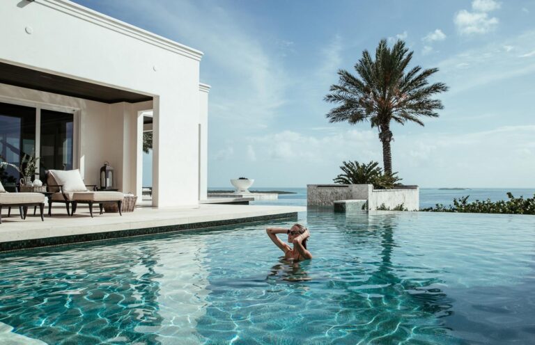 Infinity pool and terrace looking out over the sea, Over Yonder Cay
