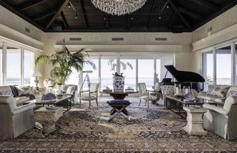 The conservatory at Meridian House, with a grand piano and sea views, Over Yonder Cay