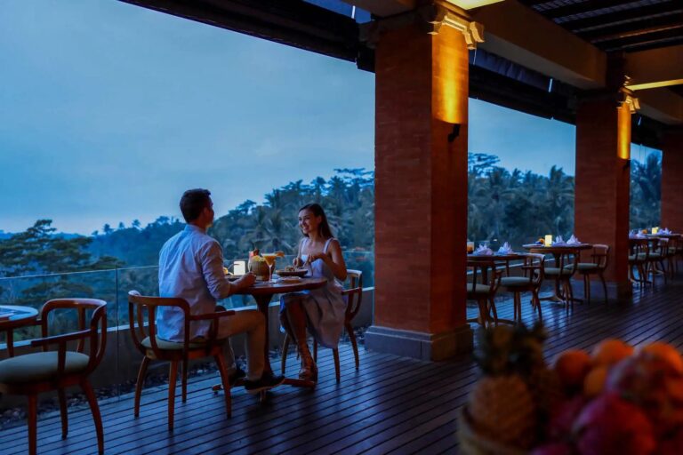 The Puhu Restaurant terrace at dusk, Padma Resort Ubud