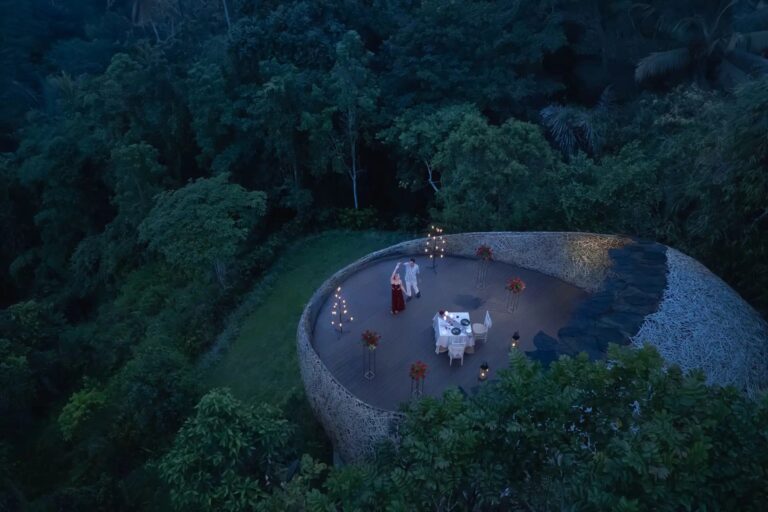 Private dinner for two on the Bamboo Nest deck, seen from above, Padma Resort Ubud