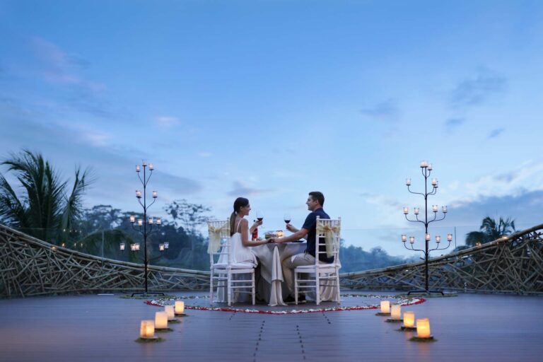 Candlelit dinner for two on the deck at dusk, Padma Resort Ubud