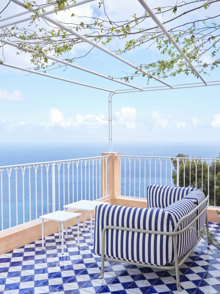 Pergola terrace with a blue-tiled floor and sea view, Palazzo Avino