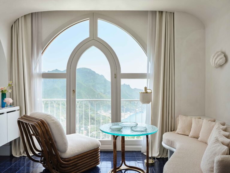 Room with an arched window over the mountains, Palazzo Avino