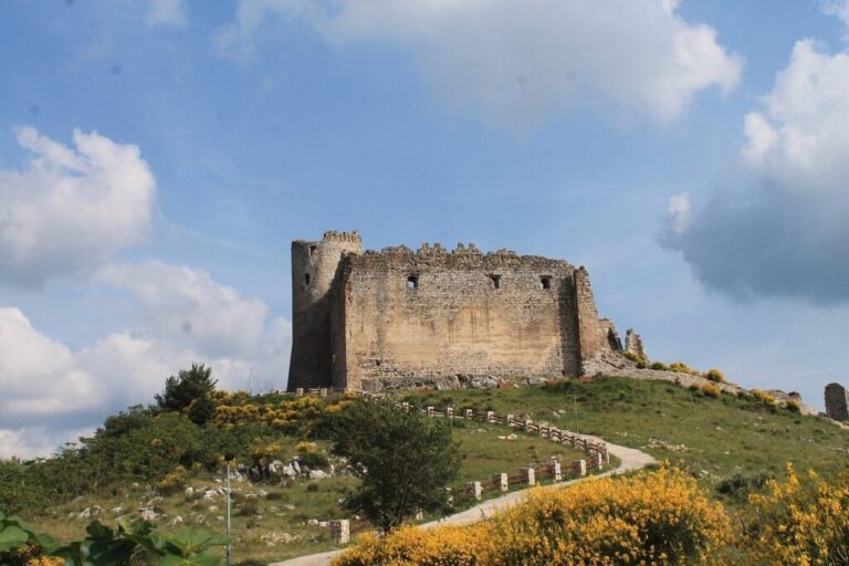 The ancient castle of Avella on its hilltop, with the valley and the path below, Palazzo Ducale di Avella e Anfiteatro Romano