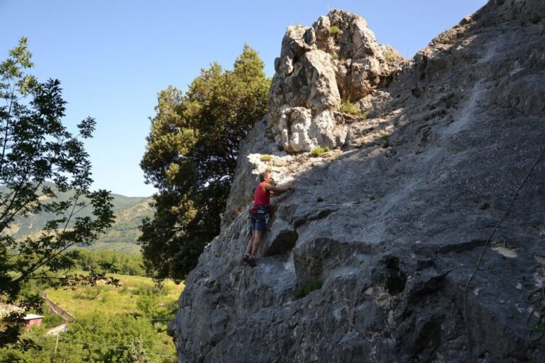 Rock climbing at the Falesia di Avella, with the Campanian valley spread below, Palazzo Ducale di Avella e Anfiteatro Romano