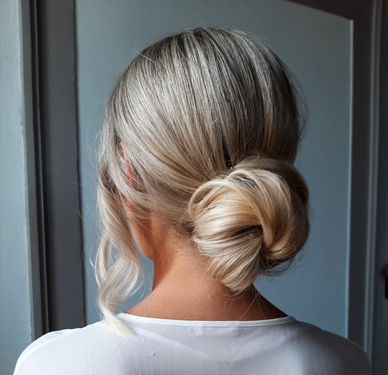 Soft low bun on blonde hair, seen from behind, Paola Giancola Makeup