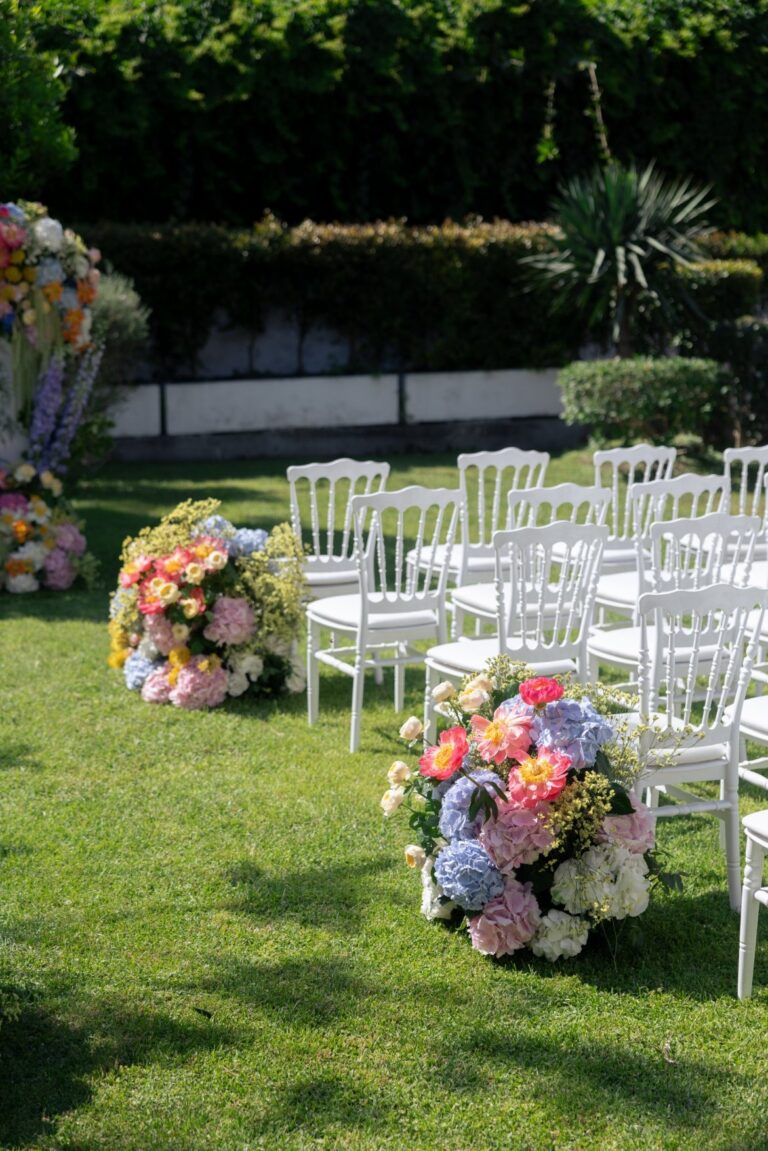 Garden ceremony chairs edged with pastel hydrangea arrangements, Villa Mon Repos, Taormina, Paola Lapi Luxury Event