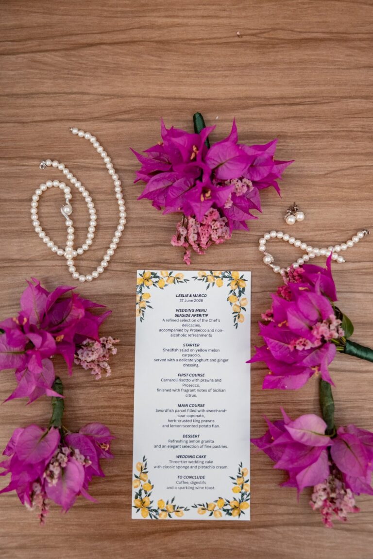 The printed menu with a lemon border, laid among bougainvillea and pearls, Capotaormina, Paola Lapi Luxury Event