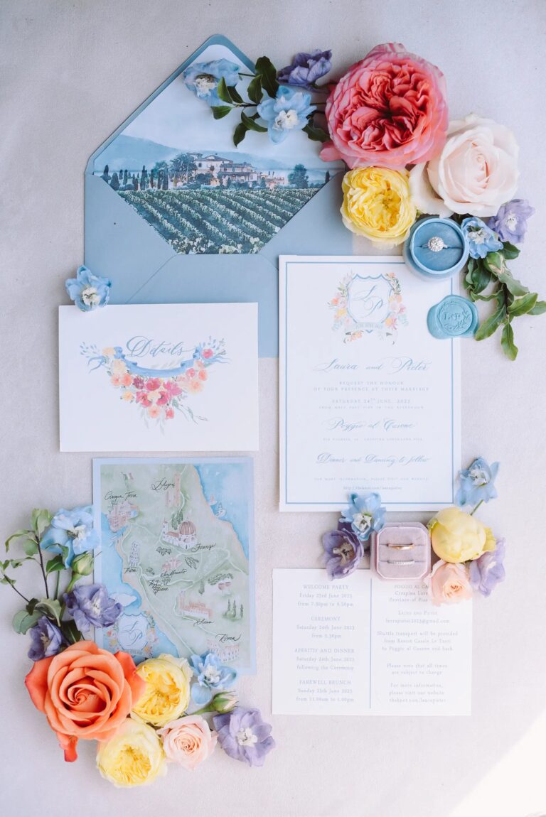Laura and Pieter's stationery, opened out: the villa-lined envelope, the crest, the ring, the roses, Paolo Cicognani Weddings & Events