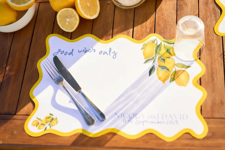 The placemat, which reads good vibes only, and underneath it Nicola and David, 11th September 2025, Paolo Cicognani Weddings & Events
