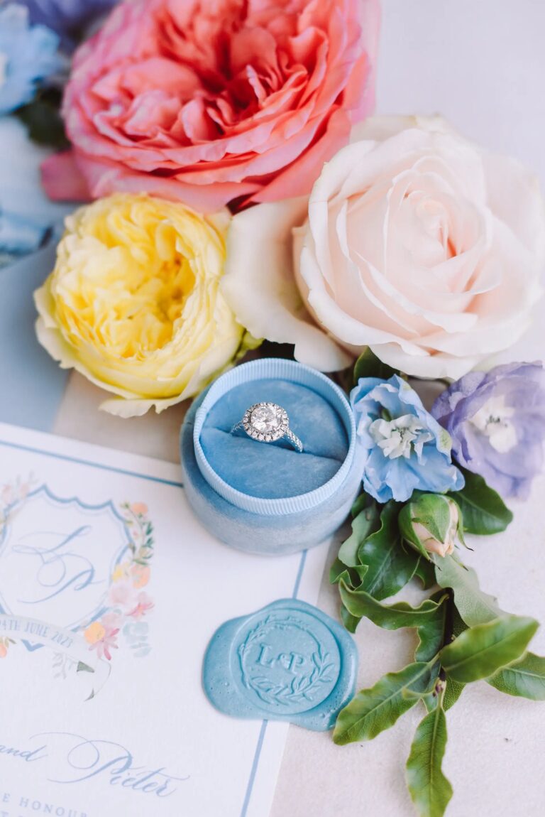 The engagement ring in a blue velvet box, beside the wax seal stamped LP, Paolo Cicognani Weddings & Events