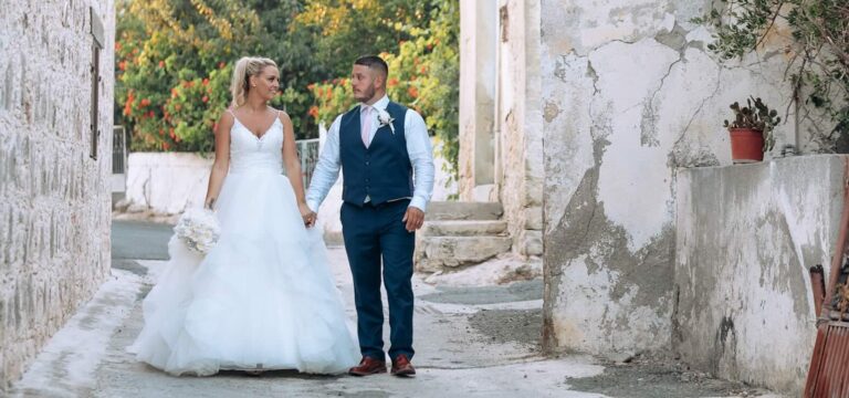 Couple in a whitewashed village lane, The Mulberry Terrace, Paphos Weddings Made Easy