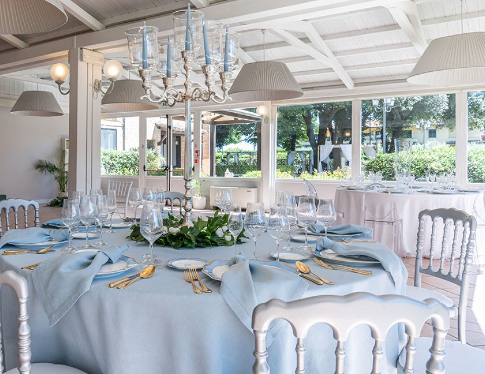 The banquet hall set for a wedding, with park views, Parco dei Cavalieri
