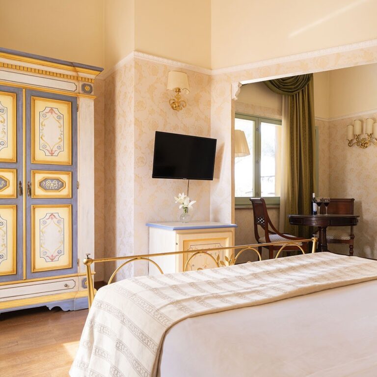 A bedroom with painted furniture, Parco dei Cavalieri