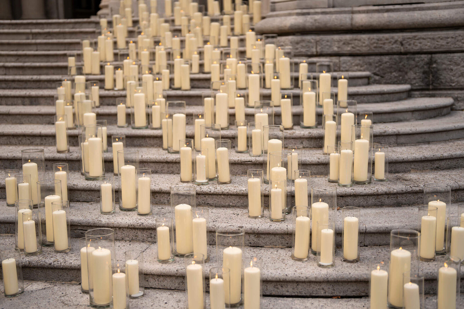 Pillar candles lining a stone staircase, Patrizia Cilli Events Italy