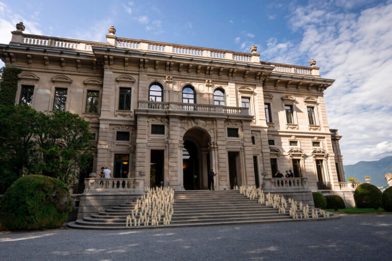Belle Epoque villa facade with candles lining the front steps, Patrizia Cilli Events Italy