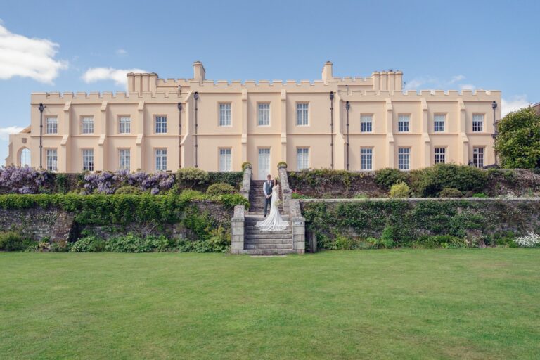 The castle facade from the lawn, with its fountain, Pentillie Castle