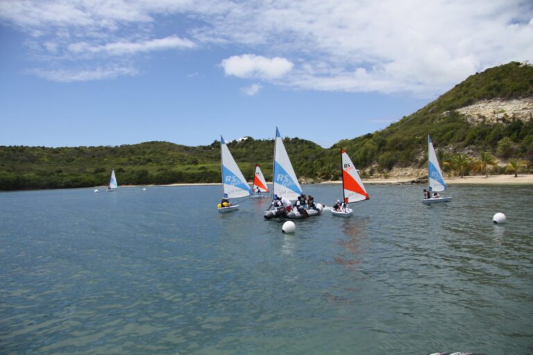 Dinghies sailing in Nonsuch Bay, Perfect Sunshine Antigua