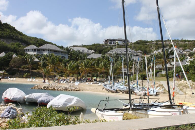 Sailing dinghies drawn up on the beach at Nonsuch Bay Resort, Perfect Sunshine Antigua