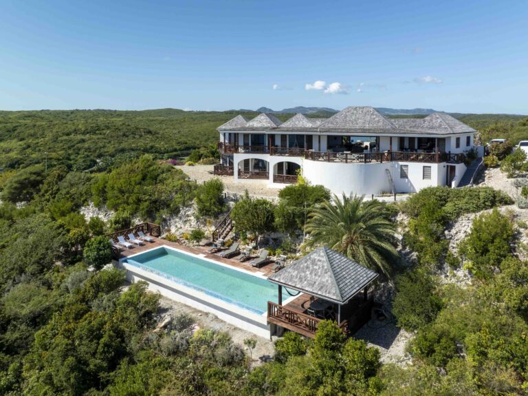 Aerial view of the villa and its long infinity pool on the hillside, Perfect Sunshine Antigua