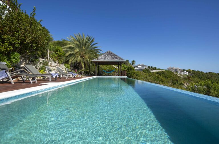The infinity pool and timber deck with sun loungers, Perfect Sunshine Antigua