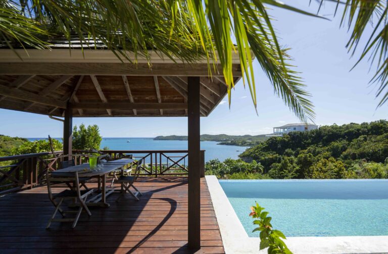 The pool gazebo with a table overlooking the bay, Perfect Sunshine Antigua