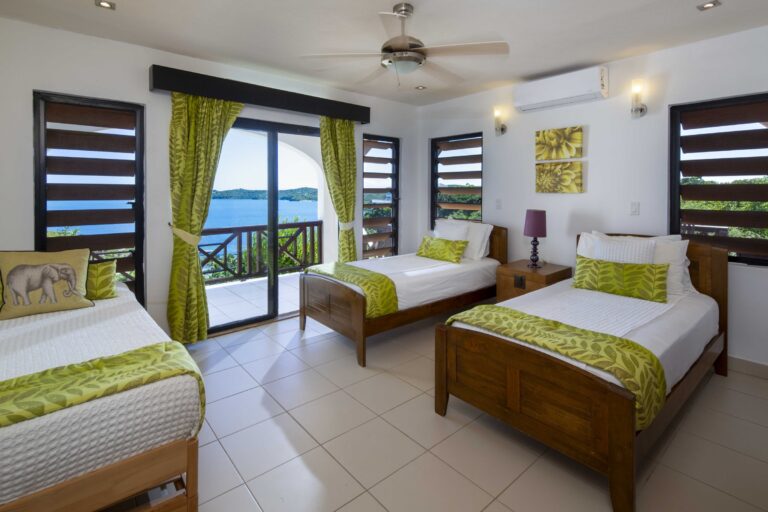 Twin bedroom with a balcony and sea view, Perfect Sunshine Antigua