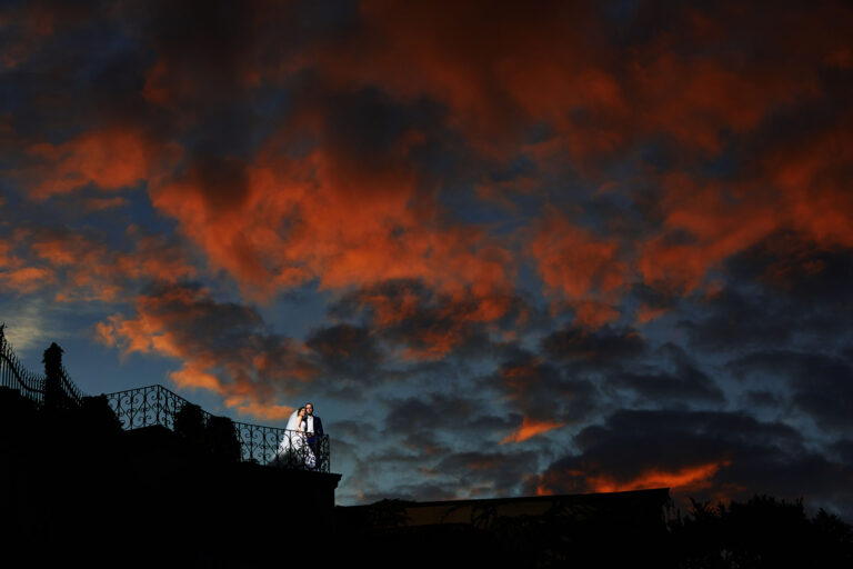 Couple in silhouette under a burning Prague sunset, Petr Pelucha Photography