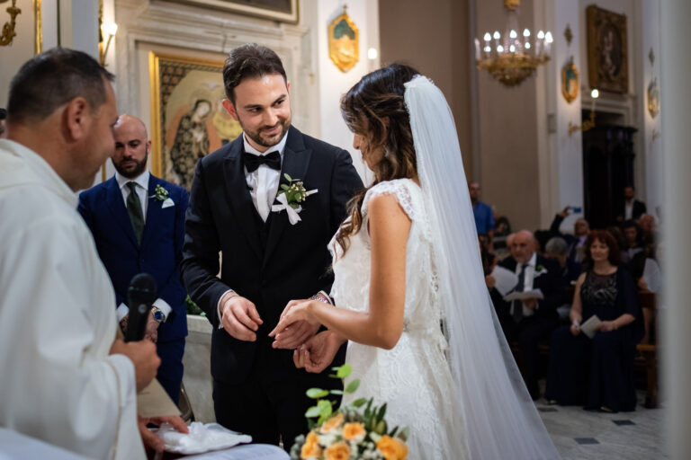 The exchange of rings at the altar, a wedding in Diamante, Calabria, Pierpaolo Perri